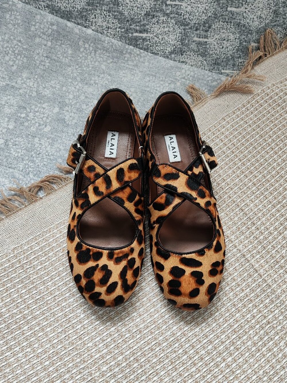 ALAÏA Leopard-Print Crisscross-Strap Mary Jane Flats